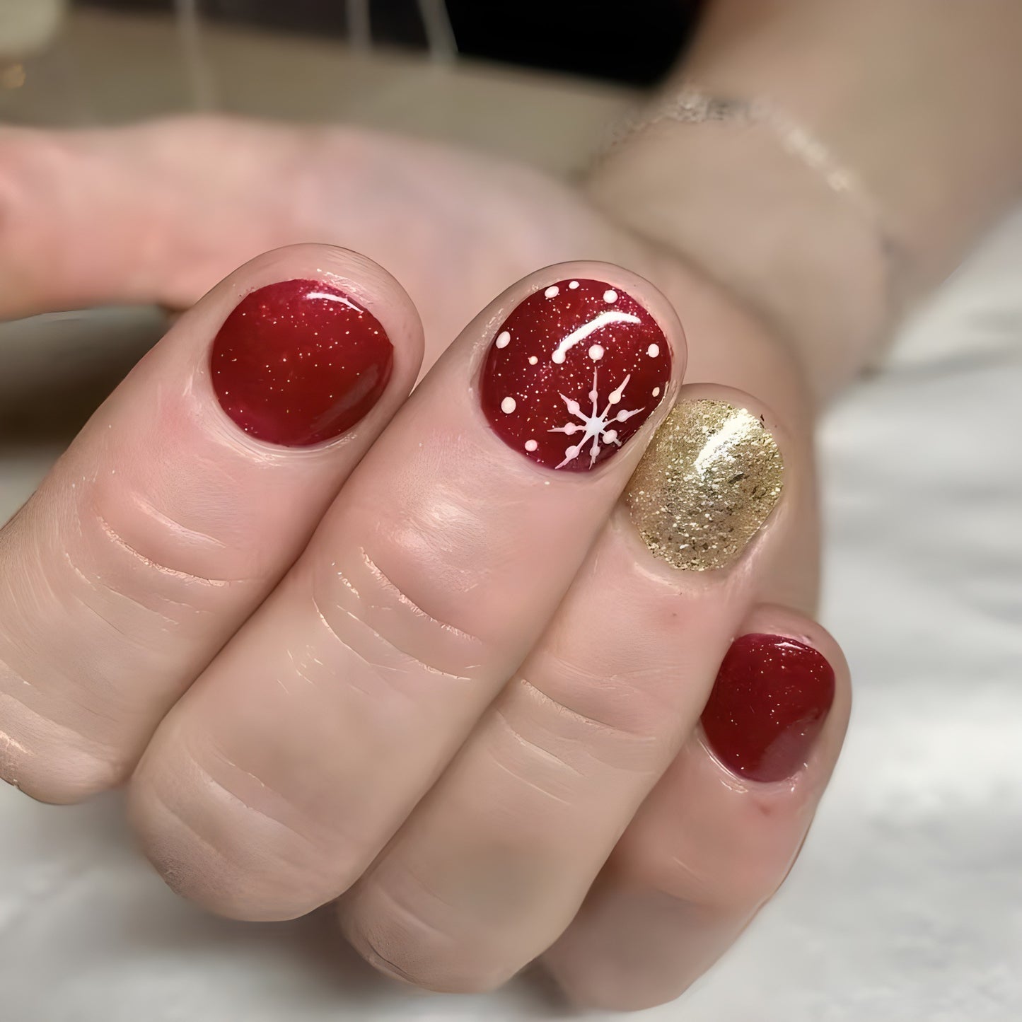 Winter Wonderland Short Round Red and Gold Glitter Press On Nail Set with Snowflake Design