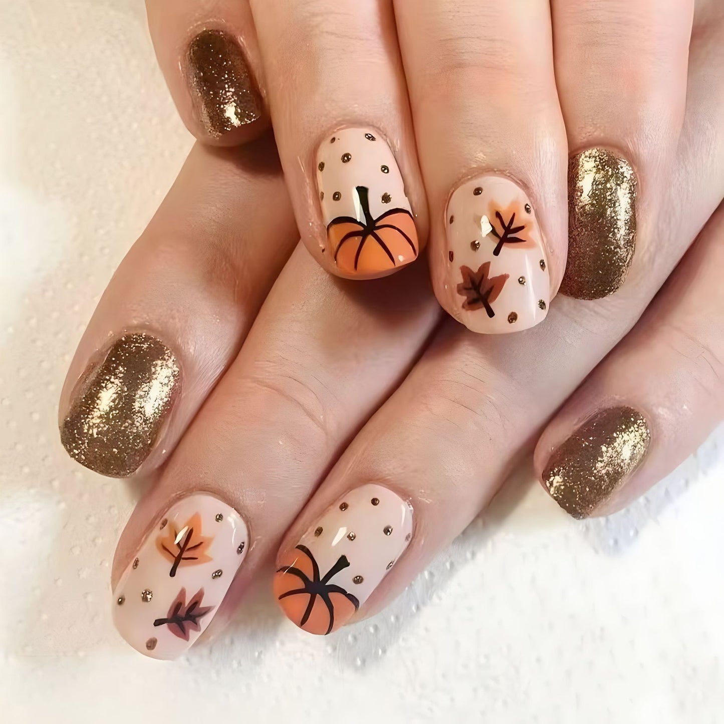 Autumn Bliss Medium Round Beige Orange Pumpkin Press On Nail Set with Glitter Accents and Leaf Designs