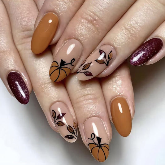 Autumn Harvest Long Almond Press On Nail Set in Warm Pumpkin Brown and Deep Burgundy with Elegant Leaf and Pumpkin Design