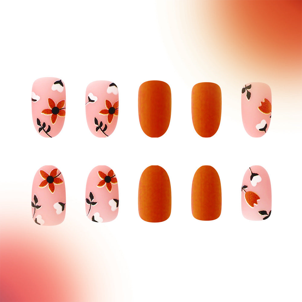 Blooming Autumn Elegance Long Oval Pink and Orange Press On Nail Set with Floral Designs and Matte Finish