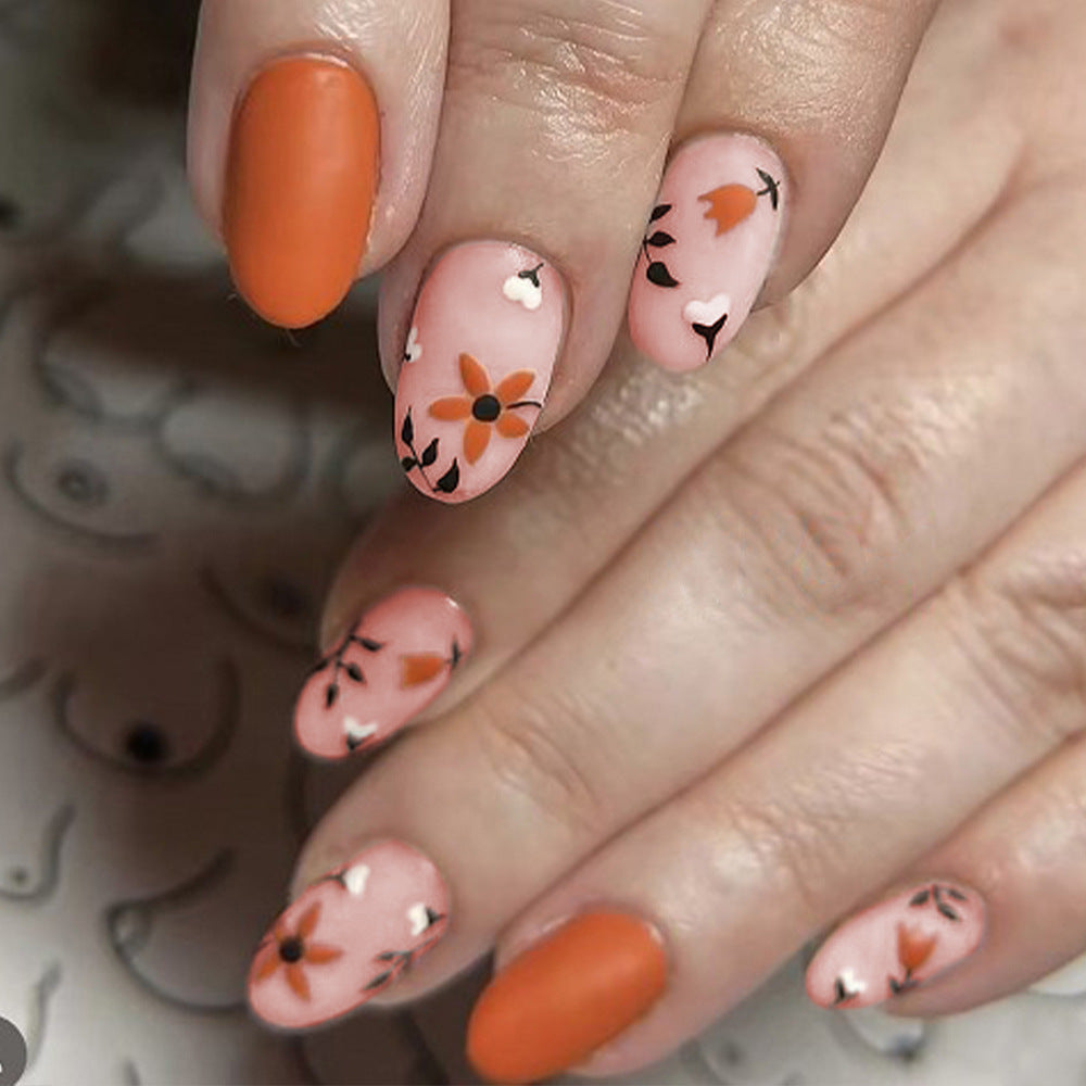 Bohemian Blossom Press On Nail Set Long Oval Orange and Pink Floral Design with Heart Accents