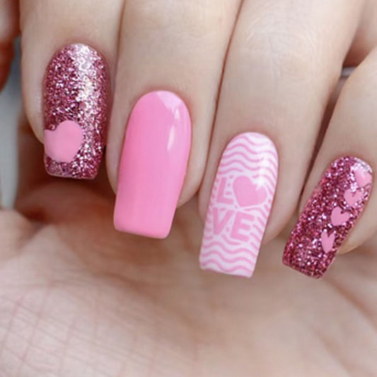 Sweet Romance Theme Long Square Pink Glitter Press On Nail Set with Heart Designs and Unique Affectionate Patterns