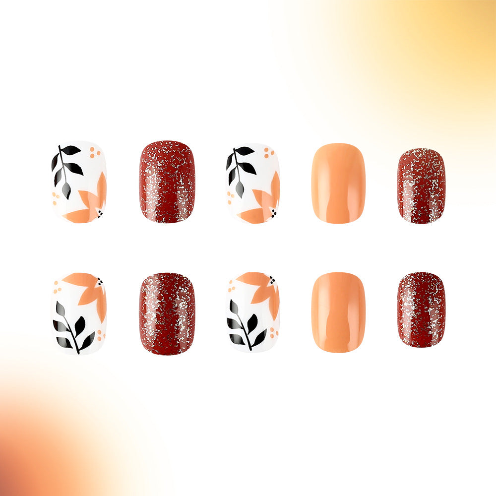 Boho Blossom Short Squoval Orange and Red Press On Nail Set with Floral and Glitter Design