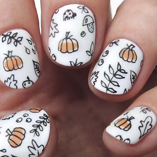 Autumn Harvest Festive Short Oval White and Orange Pumpkin Press On Nail Set with Fun Leaf Designs