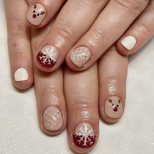 Festive Holiday Cheer Short Round Press On Nail Set in Beige White and Red with Snowflake and Reindeer Designs