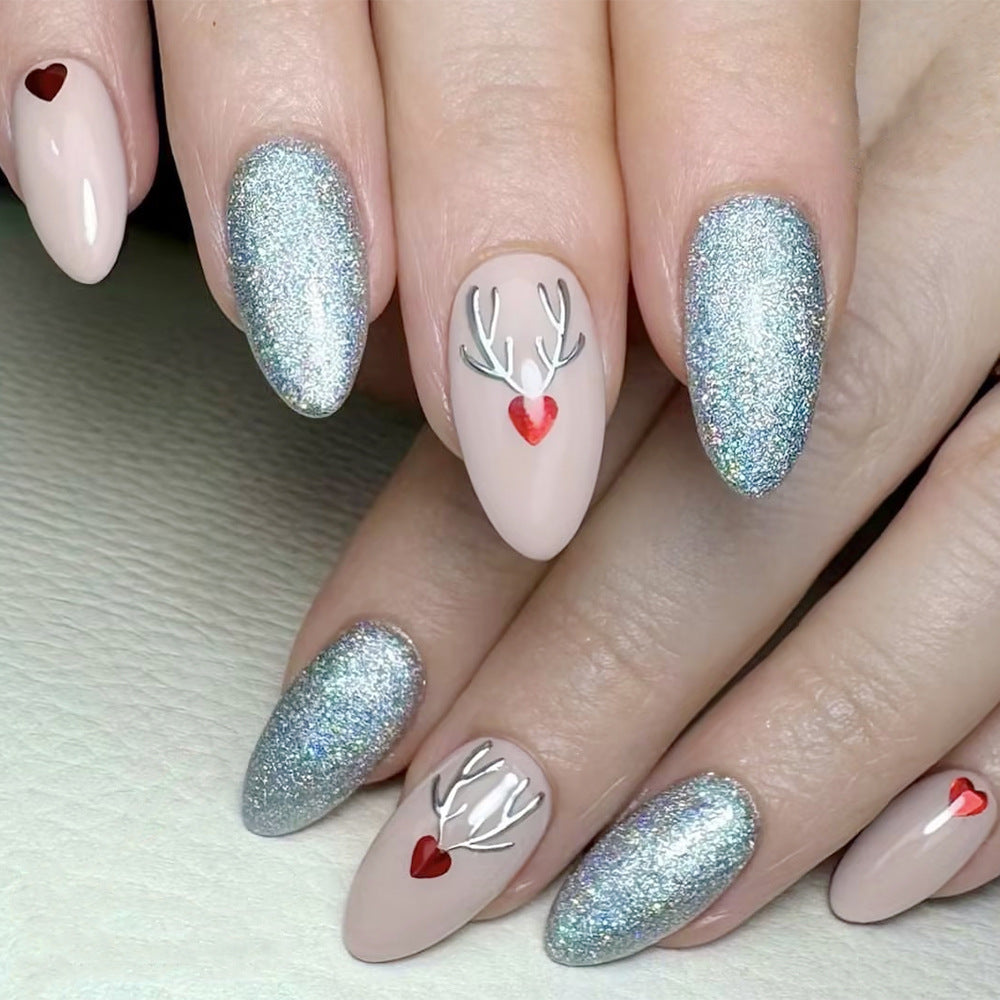 Winter Wonderland Extra Long Almond Shaped Soft Pink and Glittering Silver Press On Nail Set with Festive Reindeer Antler Design