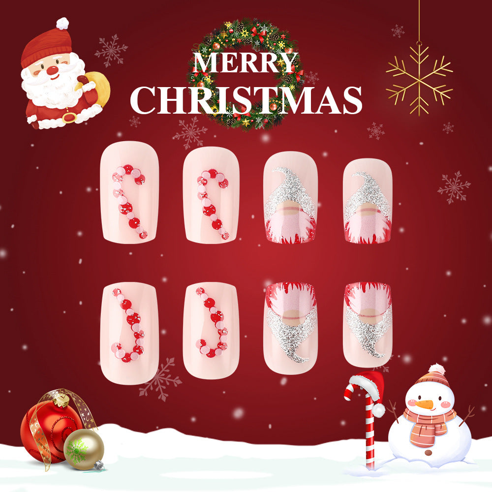 Festive Charm Medium Square Beige Nails with Candy Cane and Glitter Accent Design