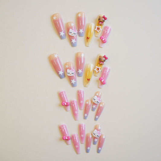 Whimsical Kawaii Press On Nail Set Long Coffin Shape Pastel Pink and Blue with Cute Character Accents