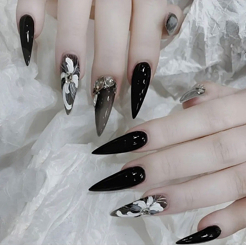 Gothic Glamour Long Stiletto Press-On Nails in Glossy Black with Silver Floral Embellishments and Jewel Accents