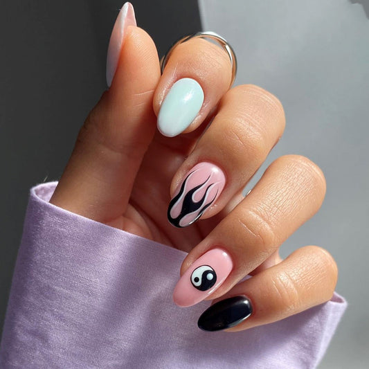 Whimsical Elegance Medium Oval Pastel Pink and Black Press on Nails with Playful Yin Yang Design