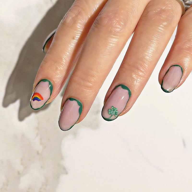 Enchanted Garden Medium Length Round Shape Pastel Pink Press On Nail Set with Green Floral Accents and Colorful Rainbow Detail