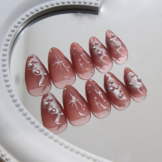 Elegant Enchantment 10 Long Almond Shape Blush Pink Nails with Pearl Accents and Unique Marble Design