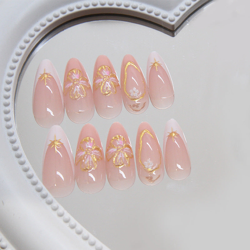 Enchanted Floral Dream Long Stiletto Peach Nail Set with Gold Accents and Glittering Designs