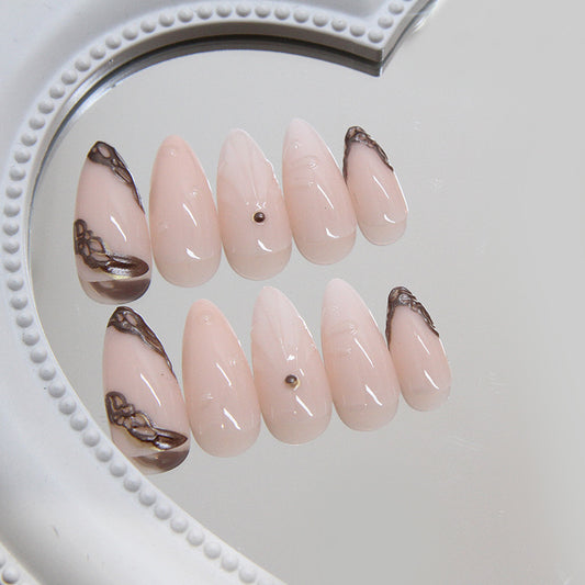 Elegant Chocolate Muse Almond Press On Long Nail Set in Blush Pink with Intricate Lace Designs and Accent Gems