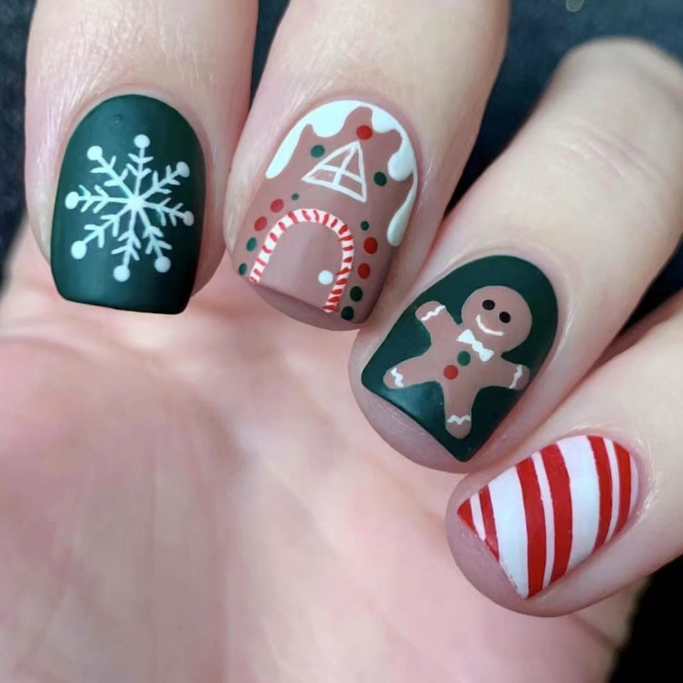 Winter Wonderland Short Length Square Press On Nails in Festive Green and Red with Snowflakes and Gingerbread Man Designs