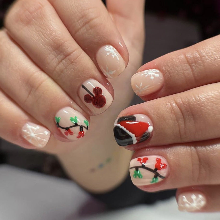 Yuletide Celebration Short Round Clear Press On Nails with Festive Holly and Santa Accents