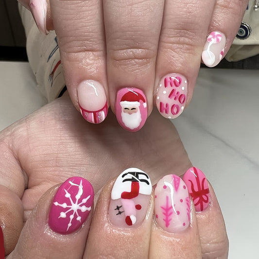 Santa's Surprise Short Oval Pink and White Press On Nail Set with Santa and Snowflake Accents