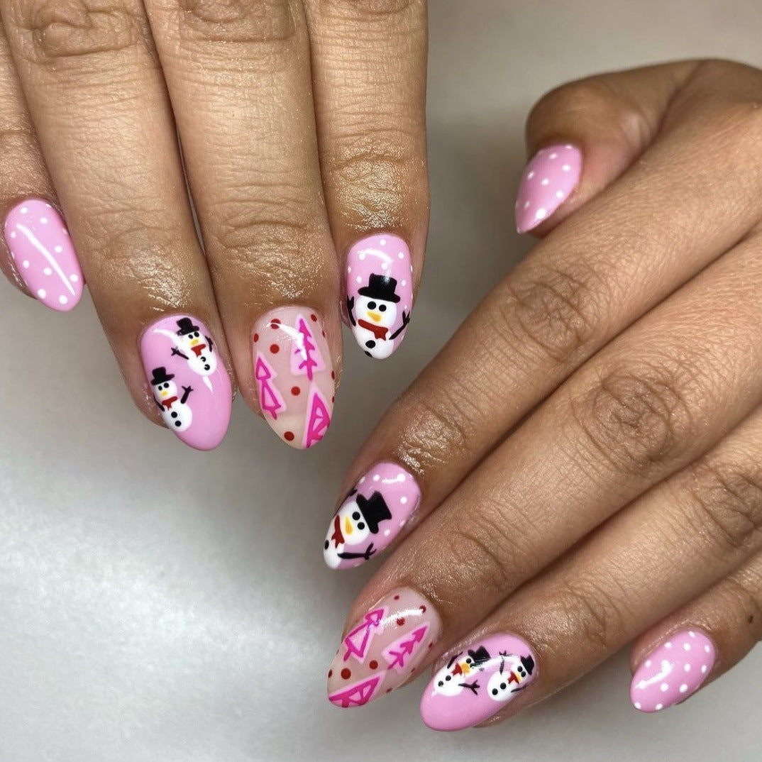 Winter Wonderland Medium Oval Pink Press On Nail Set with Snowman and Snowflake Designs