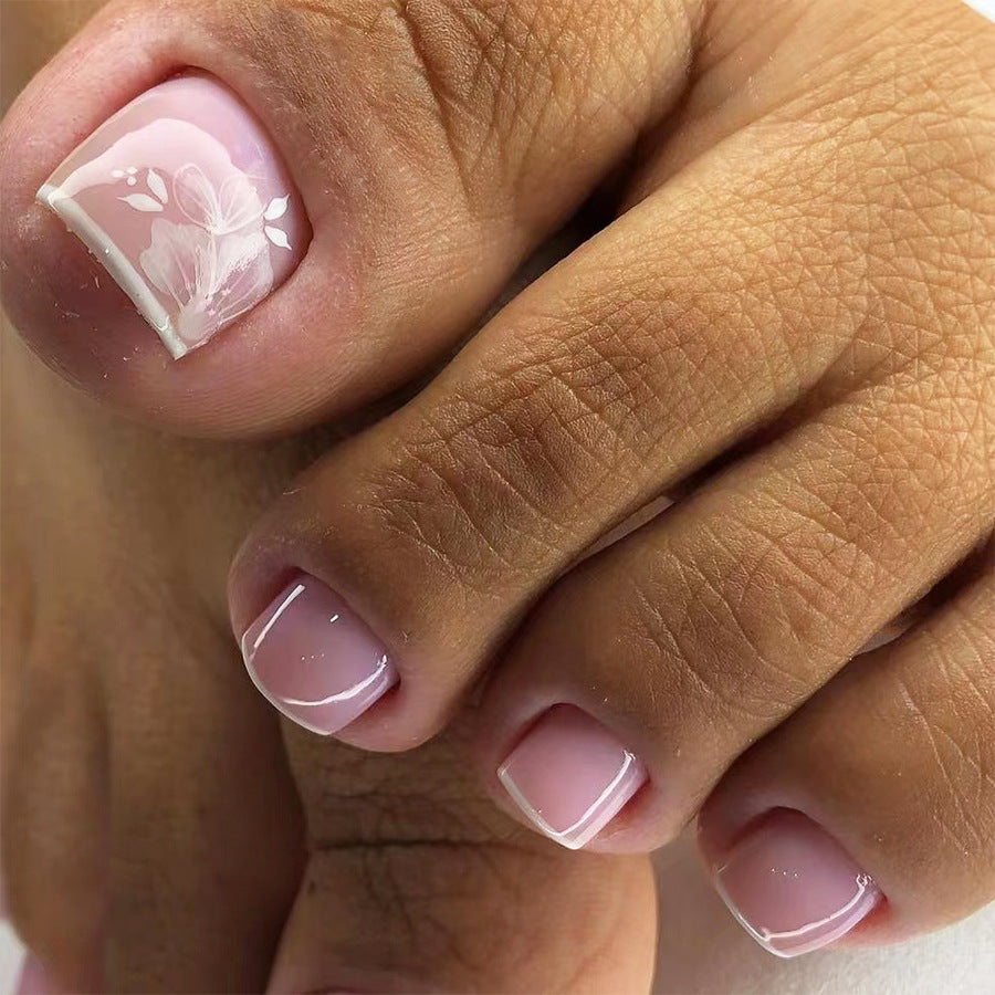 Blushing Petals Short Square Soft Pink Press On Toenails with Delicate White Floral Accent