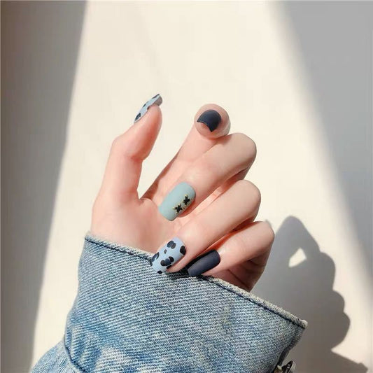 Chic Winter Wonderland Medium Squoval Matte Blue Press On Nails with Playful Paw Print Accents