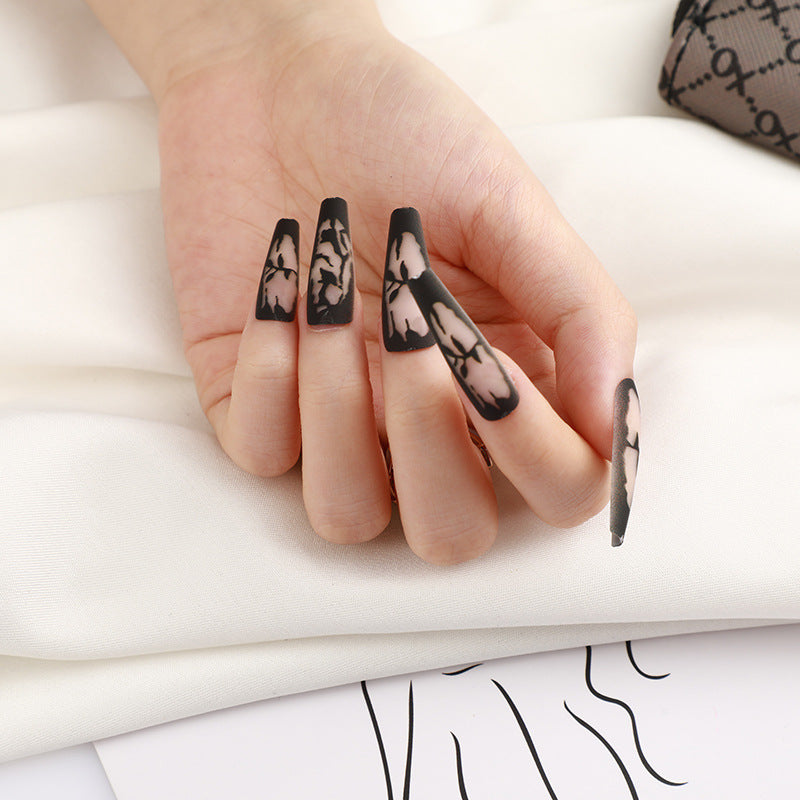 Enchanted Floral Fantasy Long Coffin Black Press On Nails with Elegant White Flower Accents