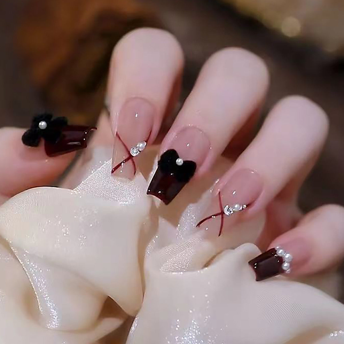 Vintage Elegance Long Coffin Burgundy Press-On Nails with Black Flower Accents and Rhinestone Detailing