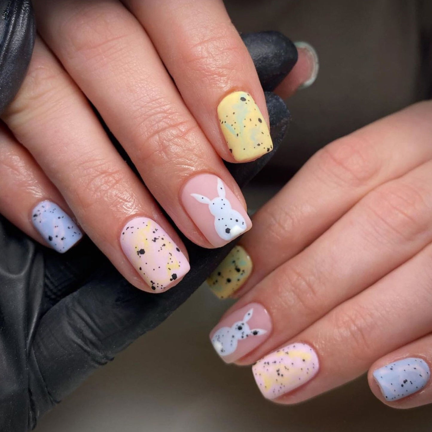 Playful Pastel Short Round Speckled Press On Nails with Bunny Illustrations and Soft Color Palette