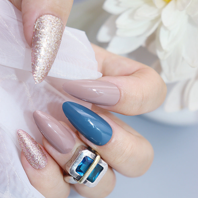 Elegant SoirŽe Long Almond-Shaped Press-On Nail Set in Mauve, Glittery Champagne, and Deep Blue with Gemstone Accent