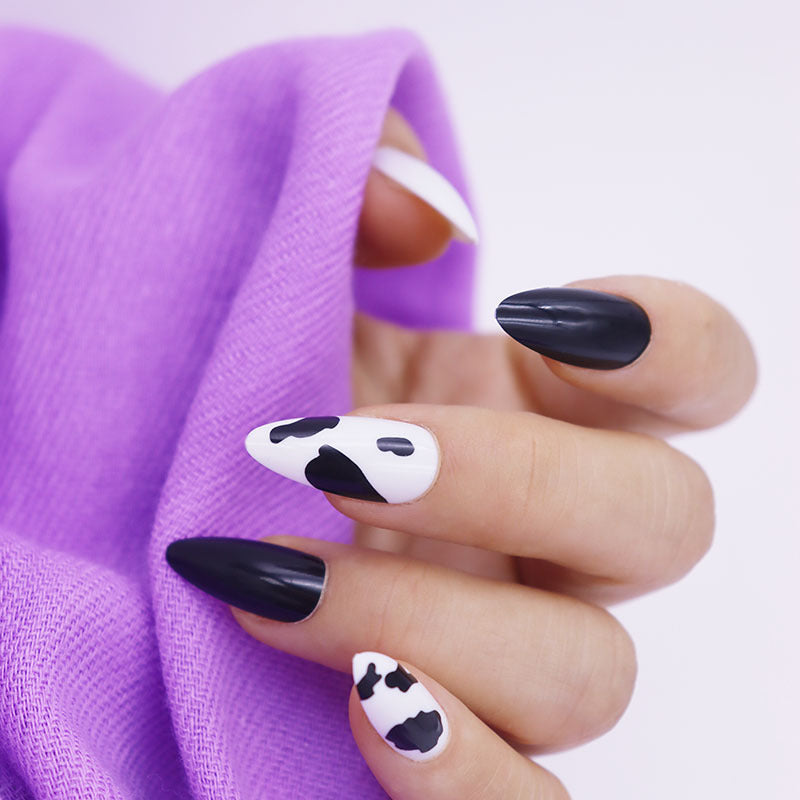 Chic Cow Print Long Almond Black and White Press On Nail Set with Trendy Animal Pattern Design