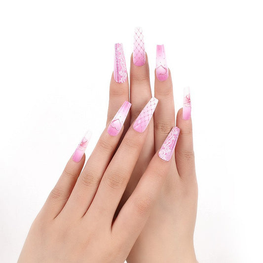 Elegant Pink Paradise Long Coffin Press-On Nails Set with Glamorous Glitter Accents and Ornate Patterns