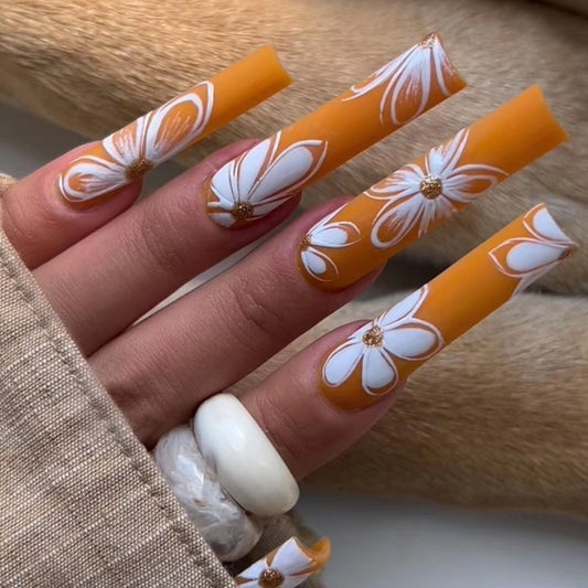 Tropical Sunset Long Square Orange Press On Nail Set with White Floral Design and Rhinestone Accents