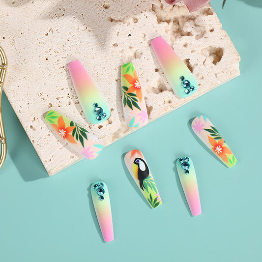 Tropical Escape Long Coffin Gradient Pink Press On Nail Set with Floral Accents and Rhinestone Embellishments