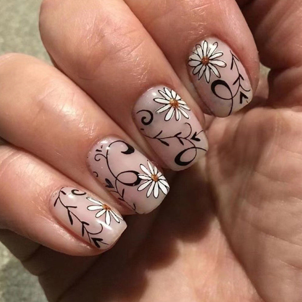 Bohemian Chic Medium Squoval Beige Press-On Nails with Whimsical White Floral Accents