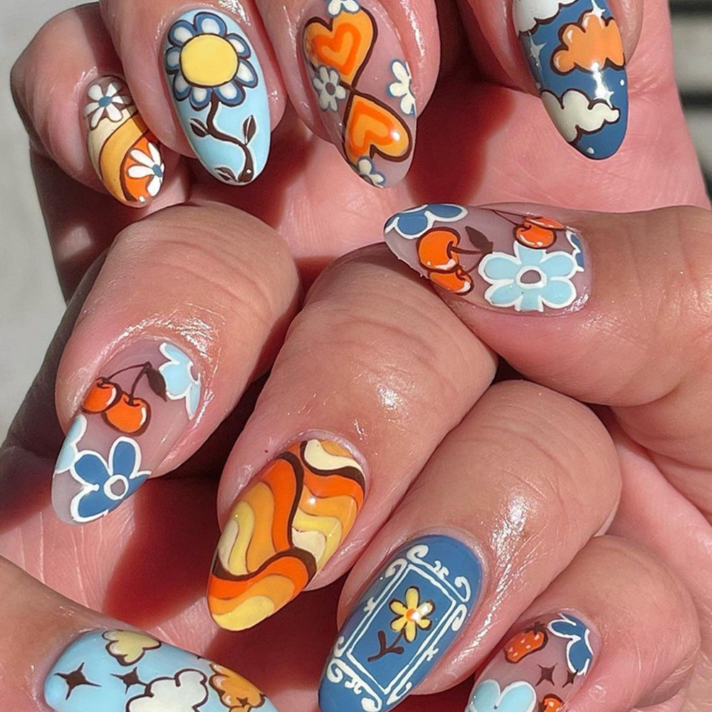 Summer Daydream Medium Almond Sky Blue Press-On Nails with Whimsical Orange and White Floral Art