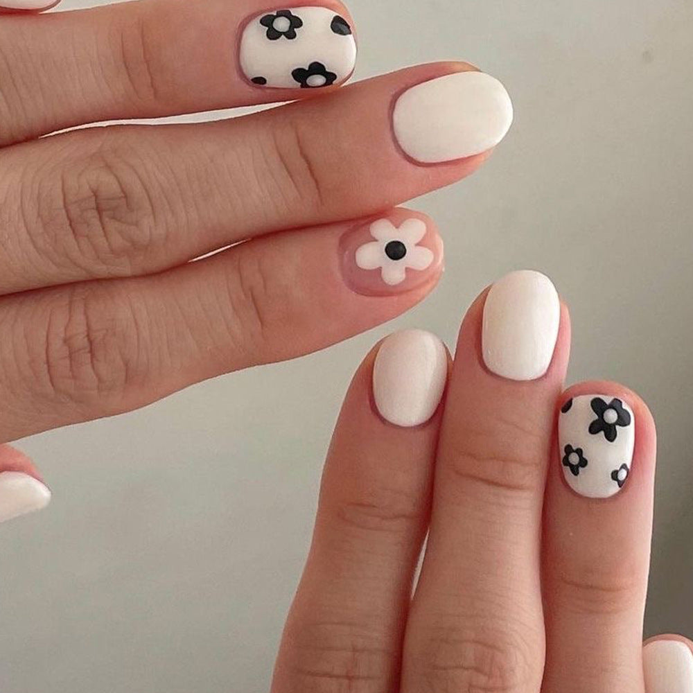 Floral Charm Short Round White Press On Nail Set with Black Flower Accents