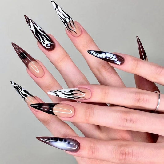 Wild Elegance Extra-Long Stiletto Press On Nails with Black and White Swirl Design and Beige Accents