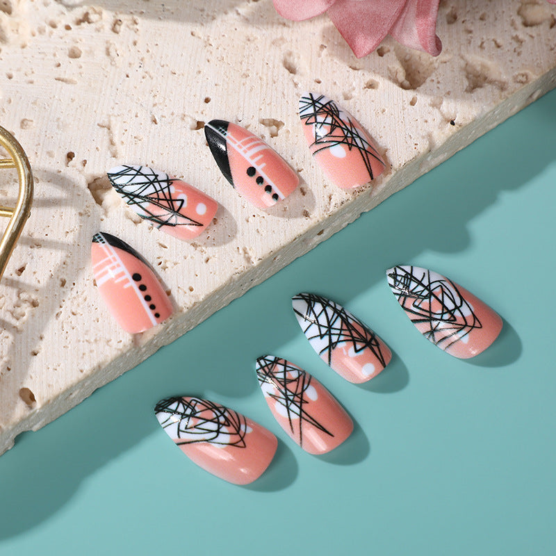 Tropical Elegance Medium Almond Peach Press On Nails with Unique Black Line Art Design