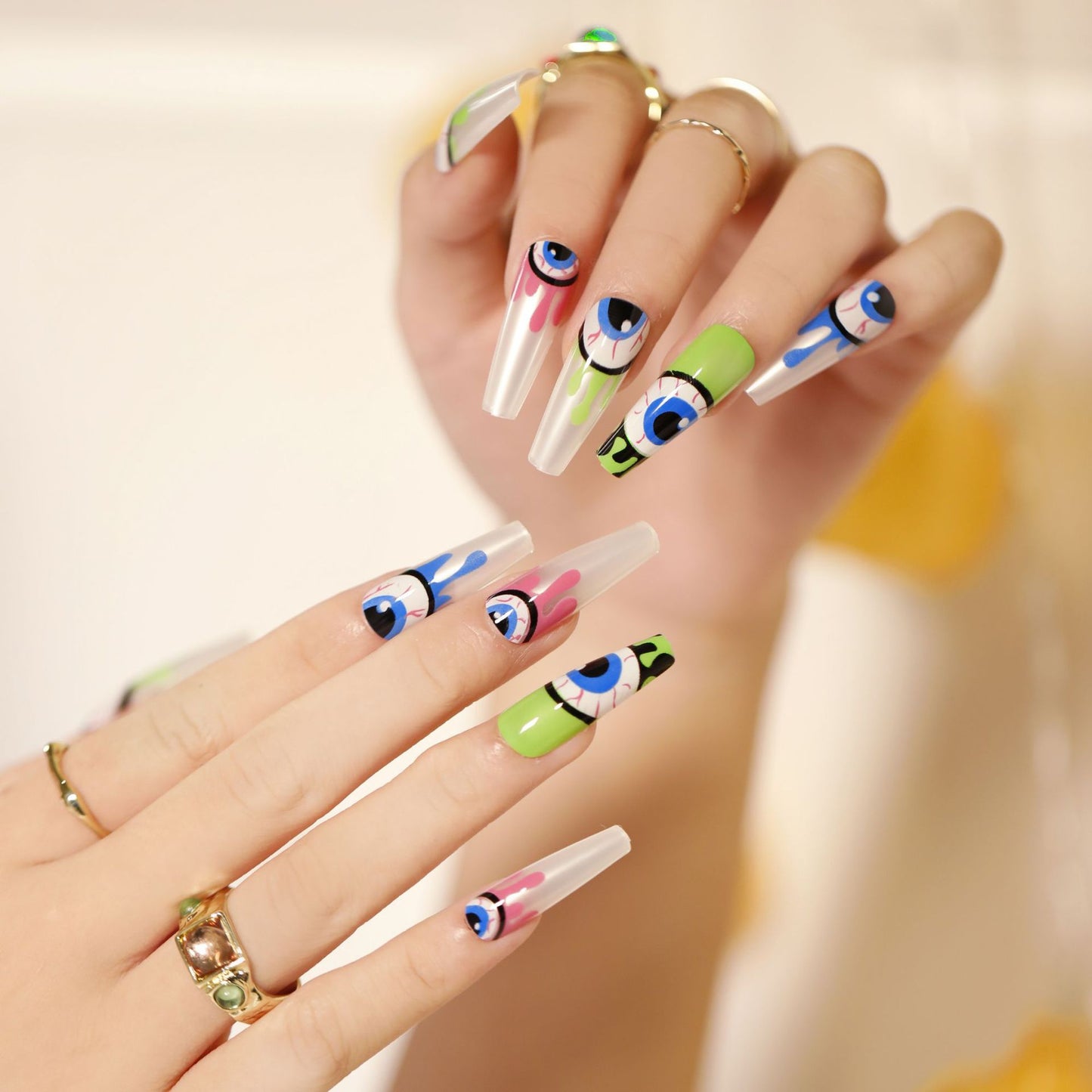 Pop Art Extravaganza Extra Long Coffin Clear Press On Nails with Cartoon Eyes Design and Vibrant Accents