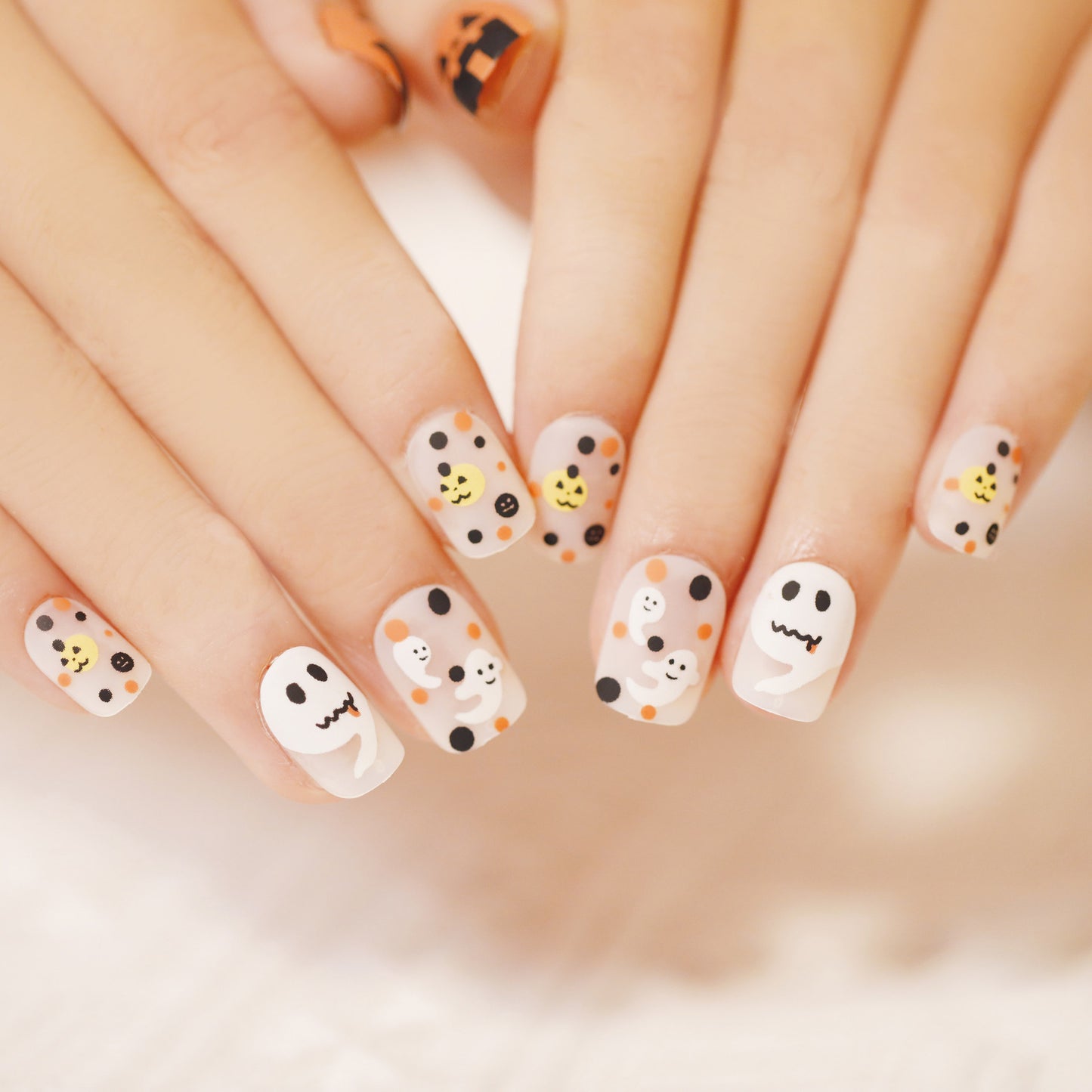 Spooky Elegance Short Squoval Beige Press On Nail Set with Ghost and Pumpkin Accents