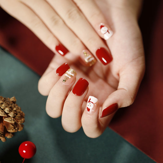 Festive Joy Short-length Square Red Press On Nail Set with Golden Accents and Holiday Designs