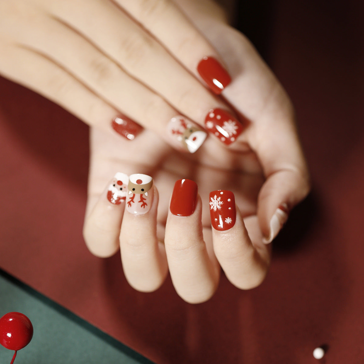 Festive Folly Short Square Classic Red Press On Nails with Snowflake and Reindeer Art Designs