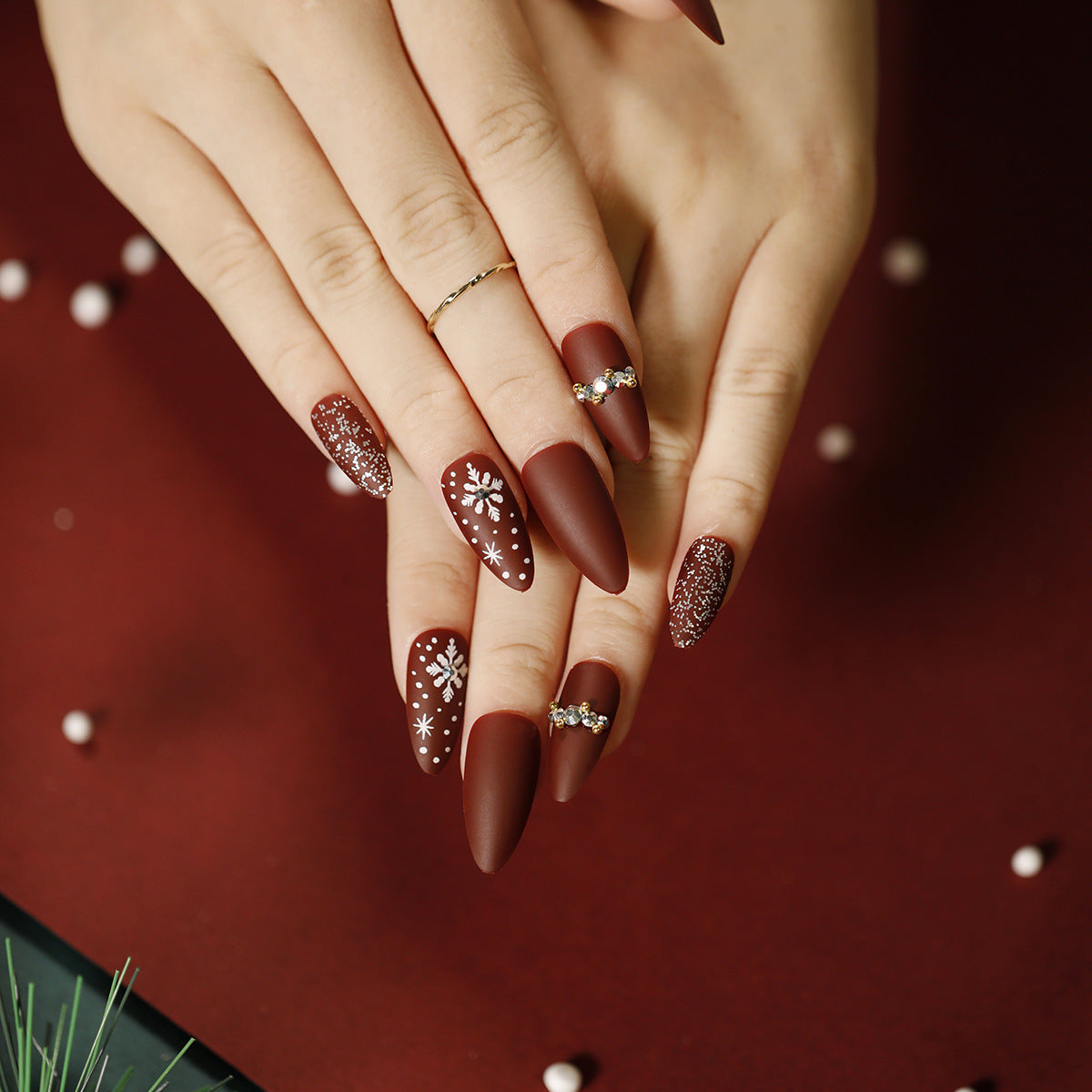 Winter Wonderland Short Almond Burgundy Press on Nails with Snowflake Accents and Glitter Detail