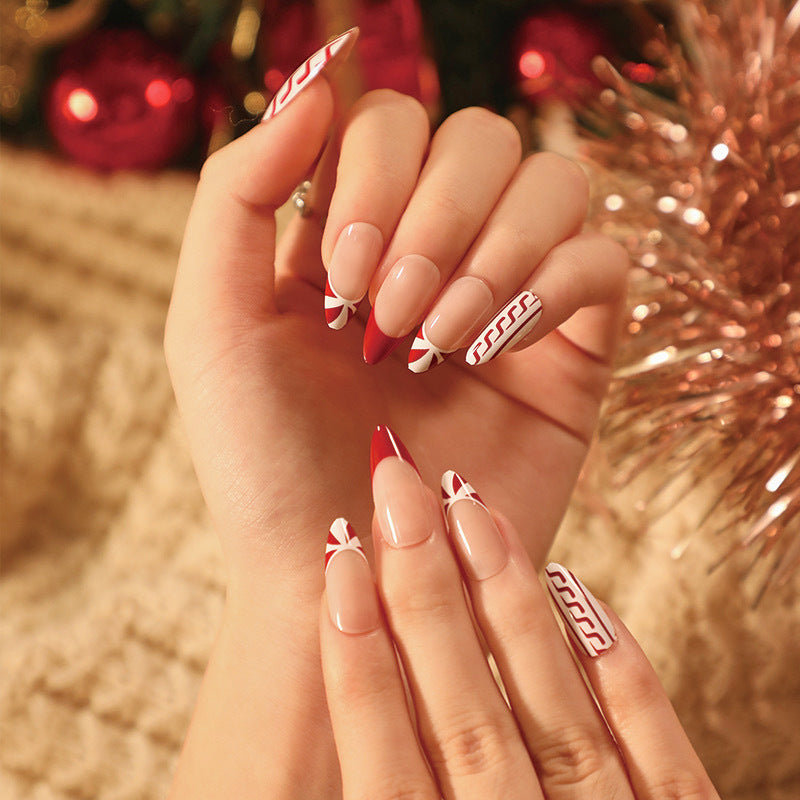 Festive Elegance Medium Oval Beige and Red Press On Nail Set with Bow Accents