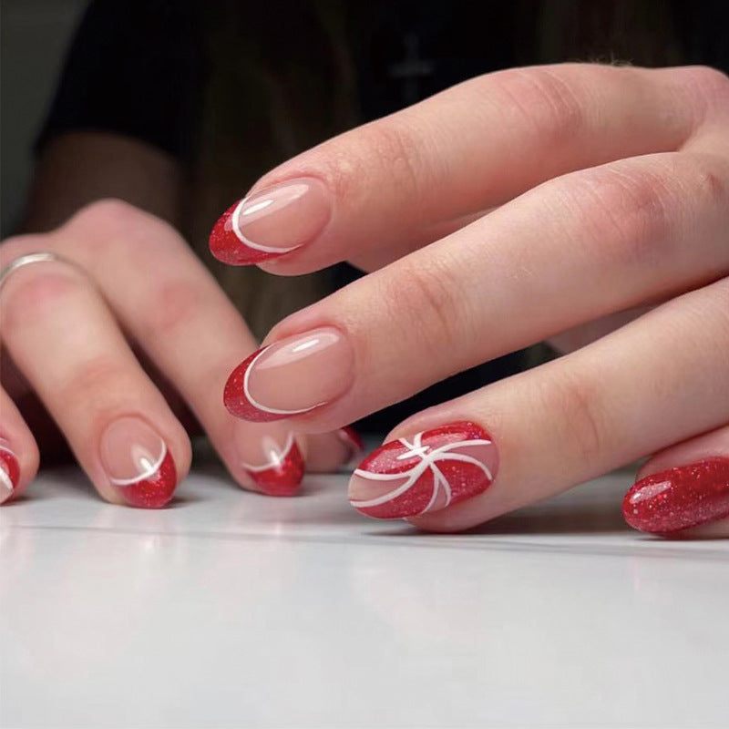 Valentine's Elegance Medium Length Oval Press On Nails in Romantic Red with Glitter Accents and White Artistic Patterns