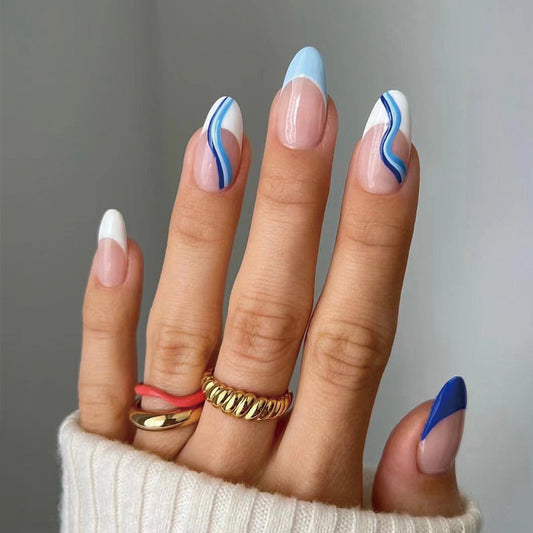 Elegant Ocean Waves Medium Almond Shaped Press On Nail Set in Blue and White with Swirl Accent Design