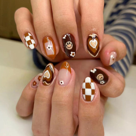 Coffeehouse Chic Medium Almond Brown Press On Nail Set with Smiley Face Accents and Checkered Patterns