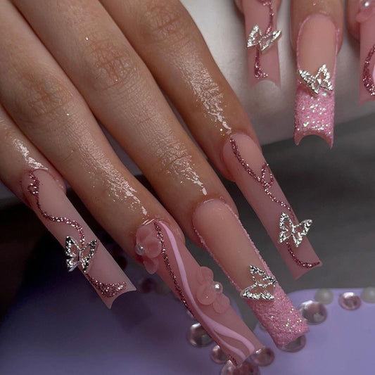 Enchanted Garden Extra-Long Coffin Press-On Nails in Sheer Pink with Glitter Accents and Butterfly Charms