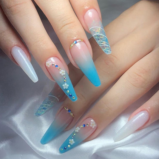 Serene Sky Long Stiletto Gradient Press-On Nails with Floral Embellishments and Glitter Accents