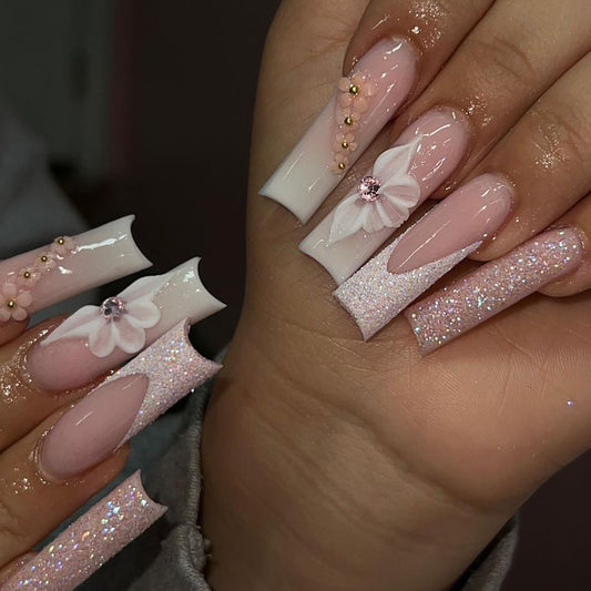 Sparkling Blossom Long Coffin Baby Pink Press-On Nails with Glitter Fade and Floral Design