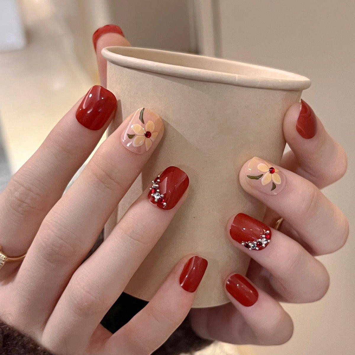 Spring Blossom Short Square Classic Red Press-On Nails with Floral Accent and Rhinestone Embellishments